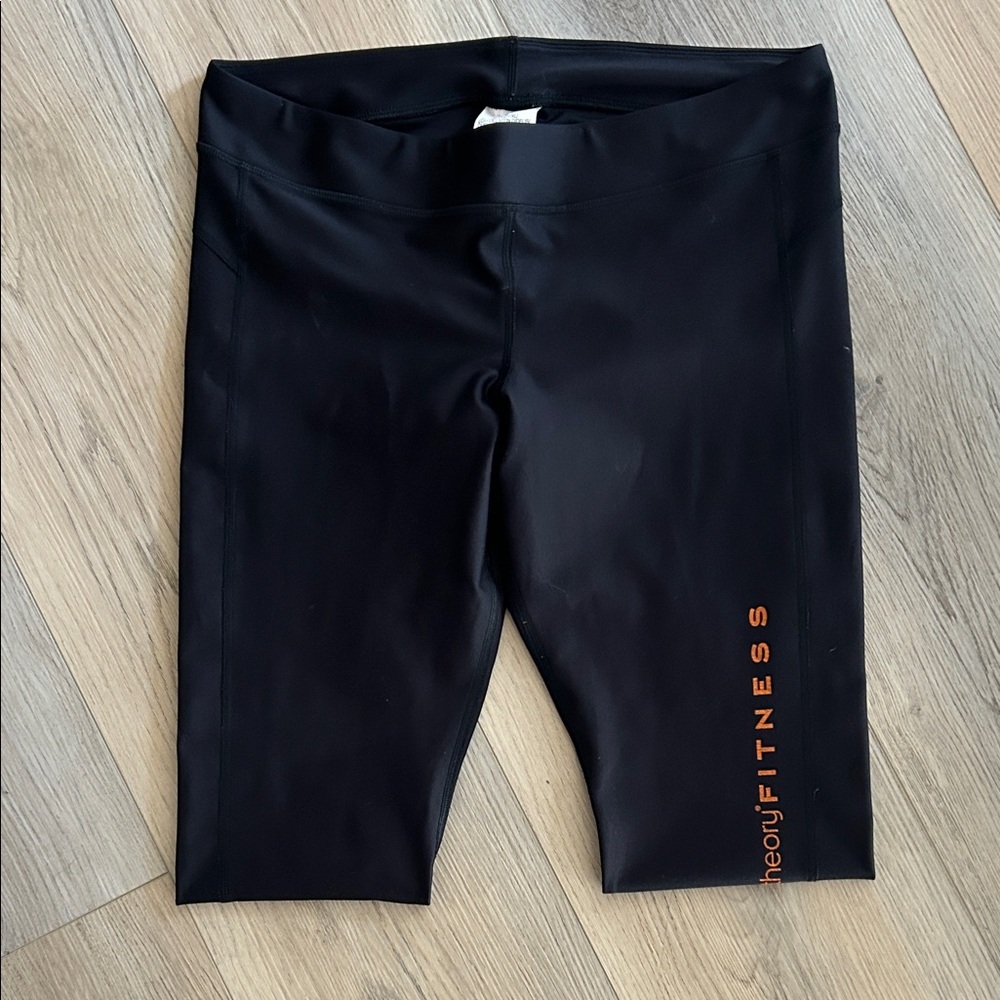 Under Armour Black Leggings with Bold Orange Logo